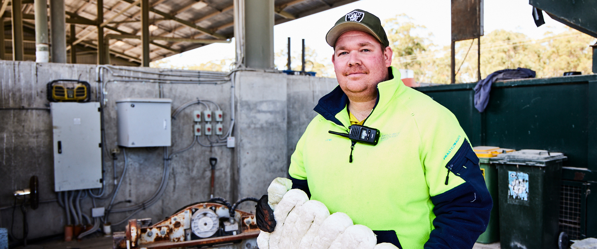 Male staff member holding recycled Expanded Polystyrene (EPS) product.